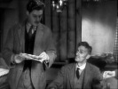 The 39 Steps (1935)Robert Donat and newspaper